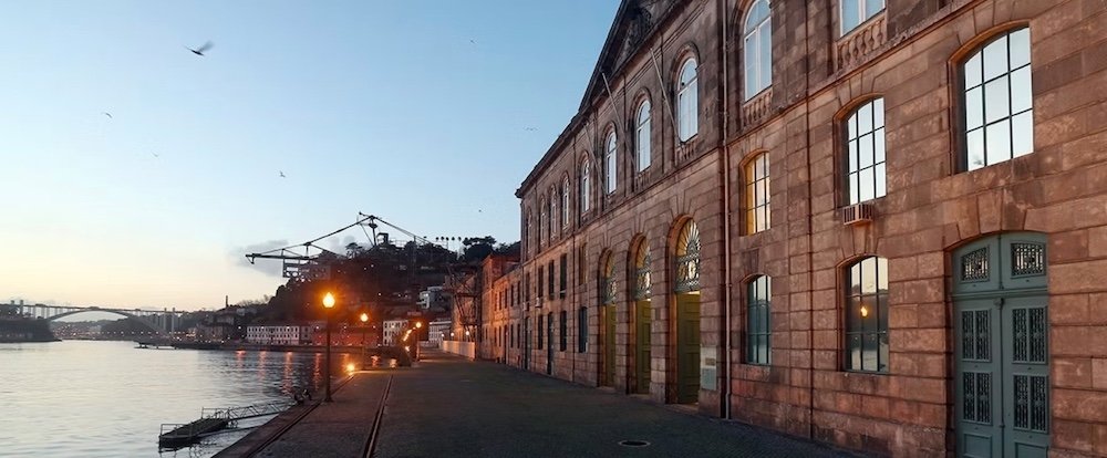 The Alfândega do Porto building on the banks of the Douro River.